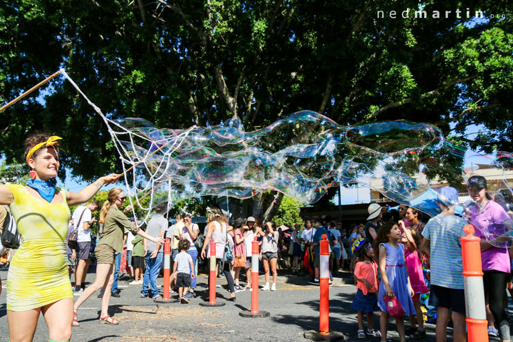 Carissa blowing bubbles, Kurilpa Derby, West End