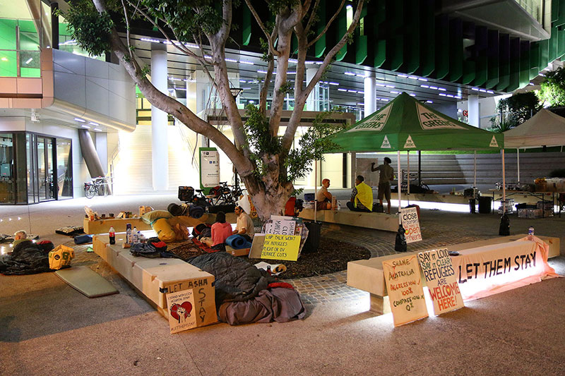 A few people camp out all night at the vigil