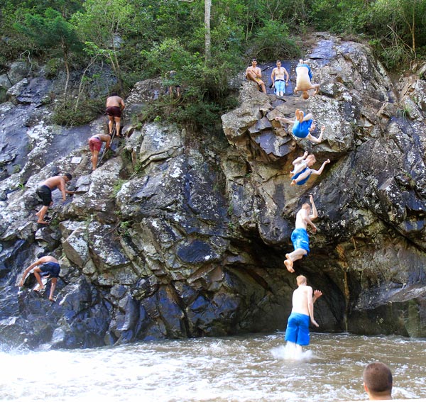 How to impress girls: Climb past the no climbing sign, do something death defying while leaping into the water, repeat.