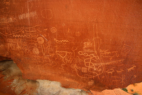 Modern graffiti and ancient petroglyphs on Atlatl Rock in the Valley of Fire