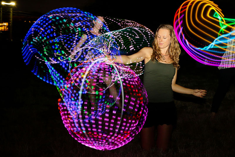 Dee hooping at the West End Fire Festival