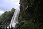 Bronwen hurrying under a waterfall