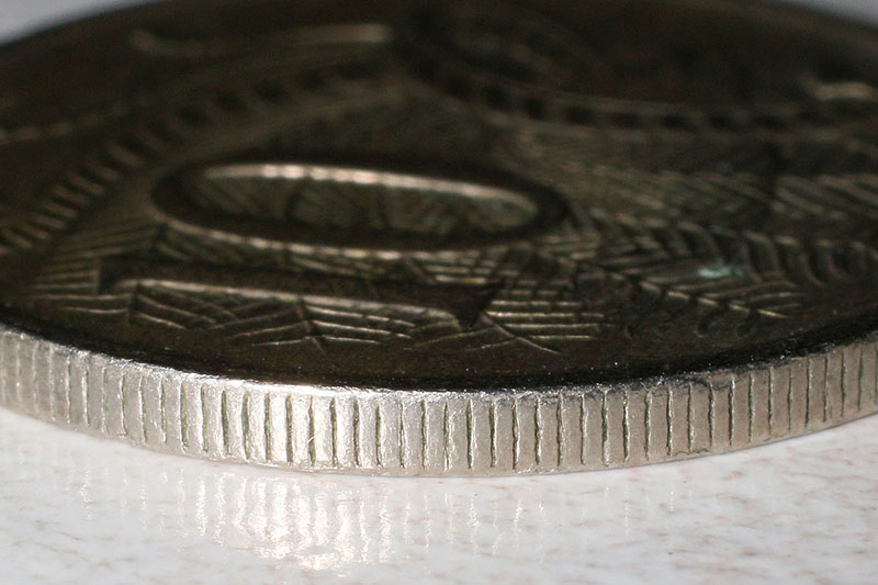 The edge of a 10¢ coin