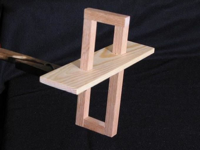 A physically impossible wooden shape.