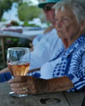 Lady with wine glass.