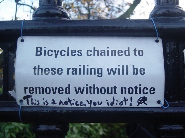 Bicycles chained to these railings will be removed without notice.  This is a notice, you idiot!