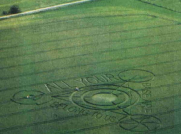 Field showing crop circle reading "All your base are belong to us"