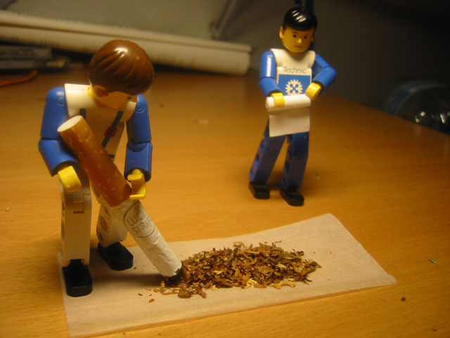 Lego figurines with tobacco products