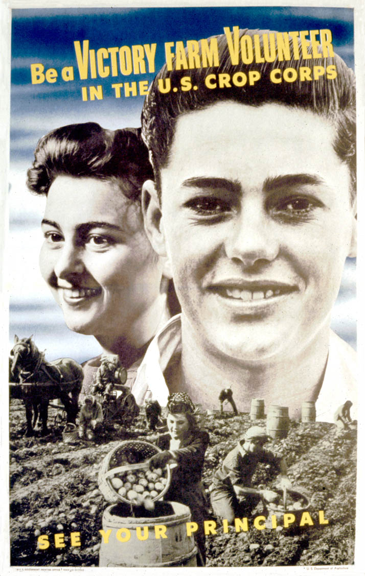 A boy and girl are pictured smiling while the foreground displays people working in the fields