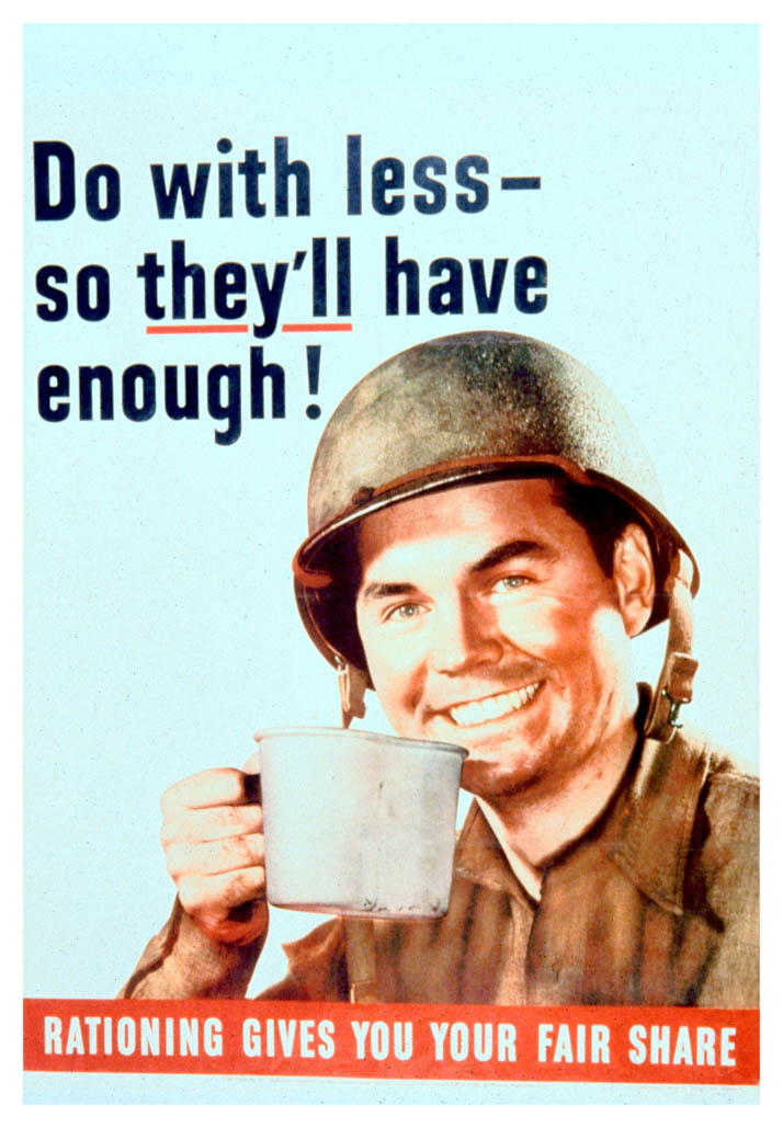 A smiling soldier lifts his canteen cup