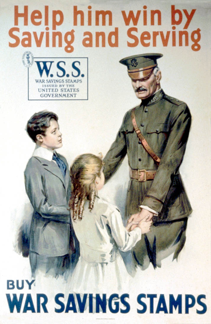 A son and daughter hold the hands of their uniformed father