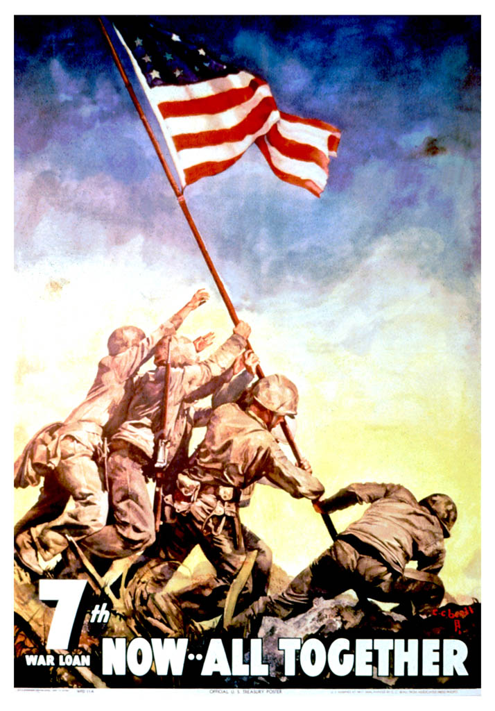 Marines raise the American flag on Mt. Suribachi