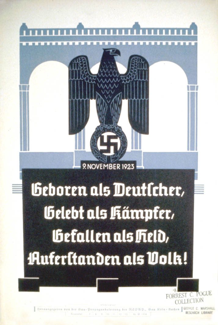 Weekly NSDAP slogan beneath the German eagle. 9